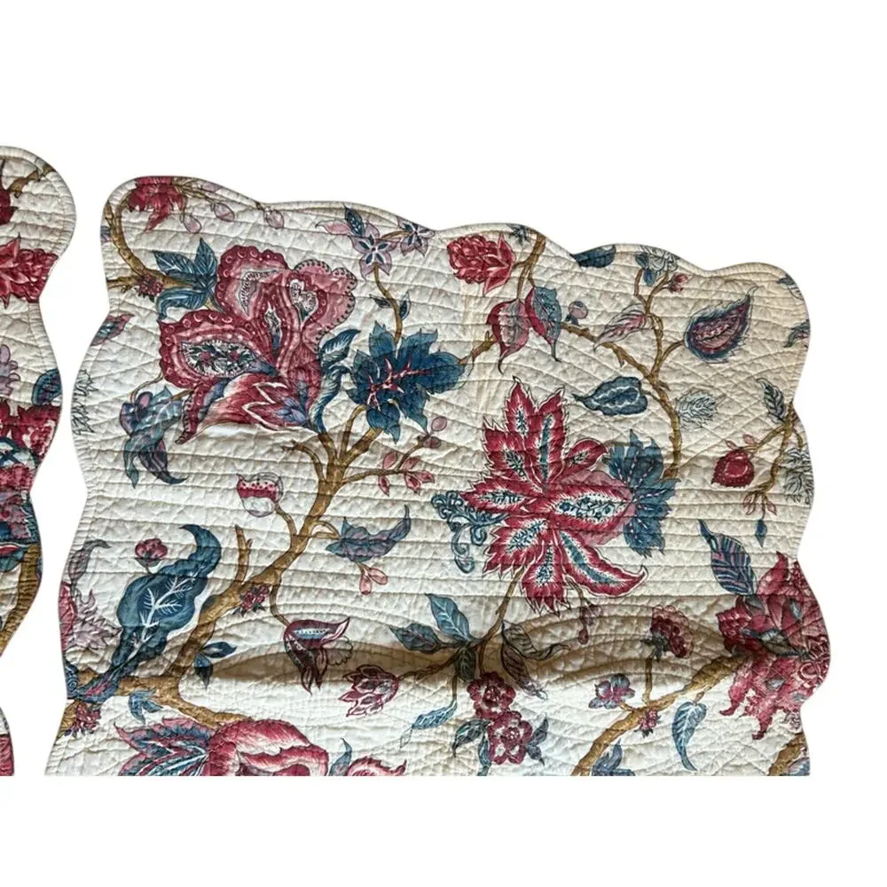 2 quilted floral standard pillow shams from Pottery Barn ?